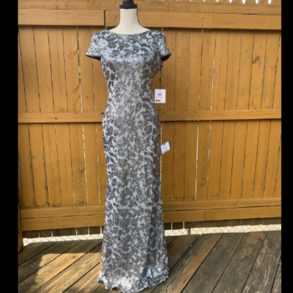 Calvin Klein cowl back silver sequin gown.